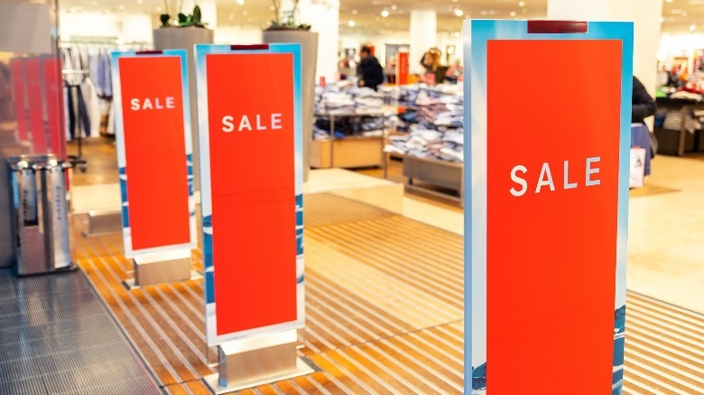 Sale signs in department store