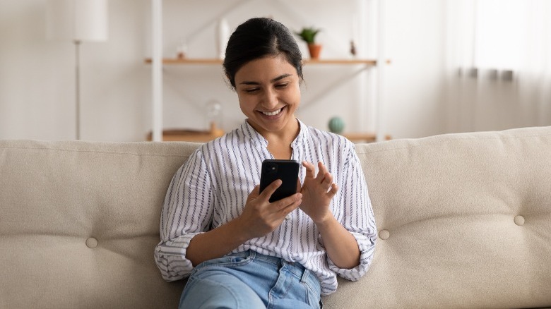 Happy woman on cellphone