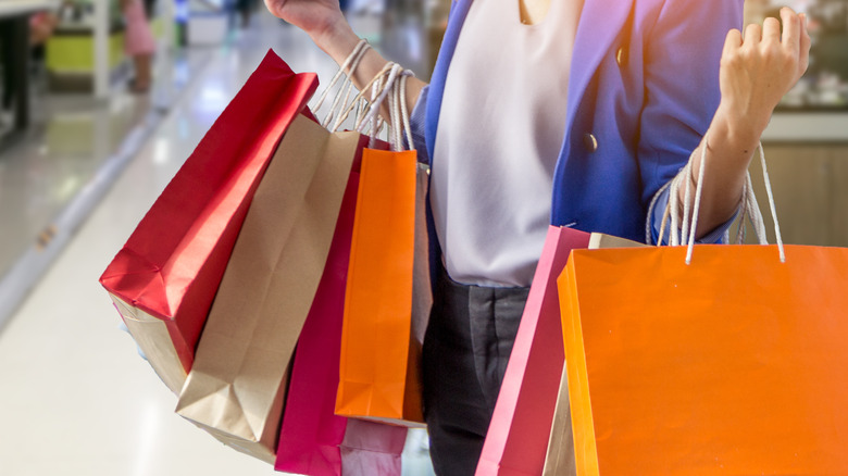 woman carrying shopping bags