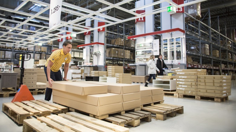 IKEA employee moving box