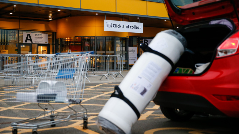 Car outside of IKEA being loaded up