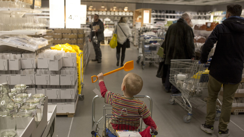 Child in shopping cart at IKEA