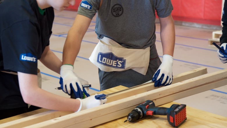 cutting wood workshop at Lowe's