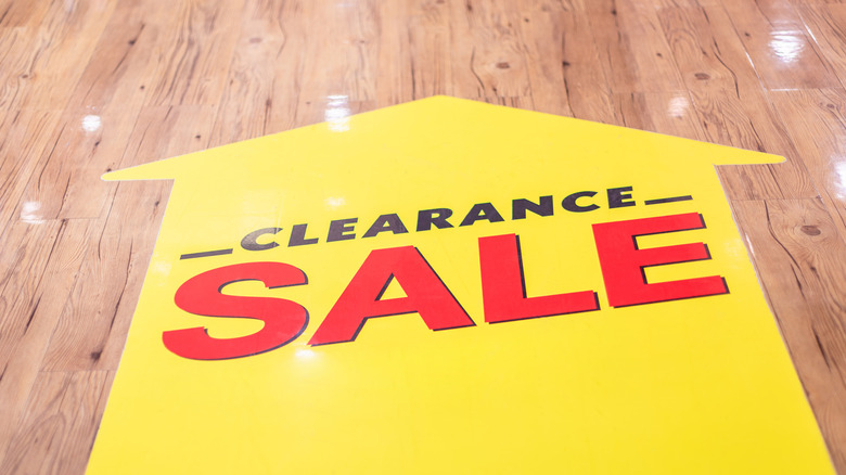 yellow clearance sale sign