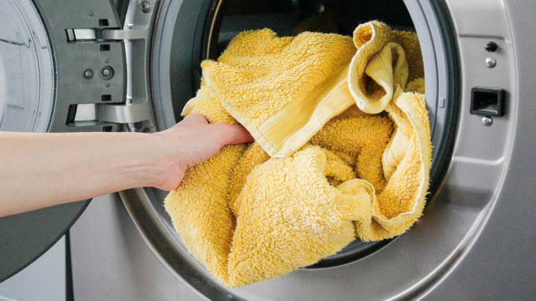 Putting towel in washing machine