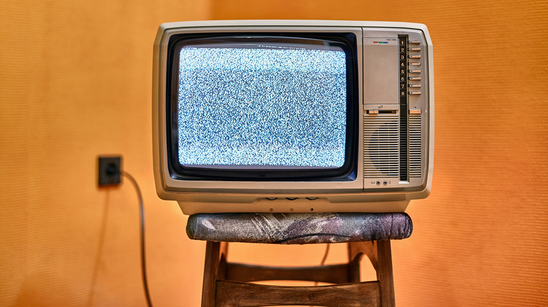 Vintage television set on stool