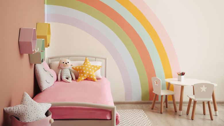 Child's playroom with rainbowed wall