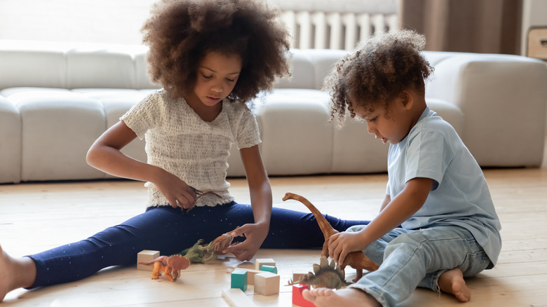 siblings playing a game 