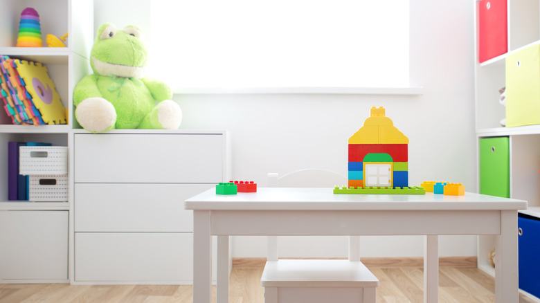 Playroom with kid sized table set 