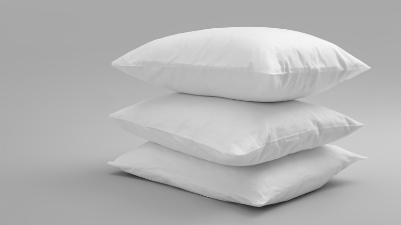 stack of three white pillows