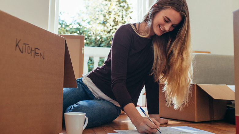 Woman making a checklist 