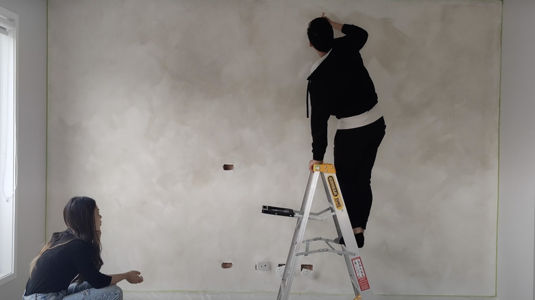 couple limewashing walls