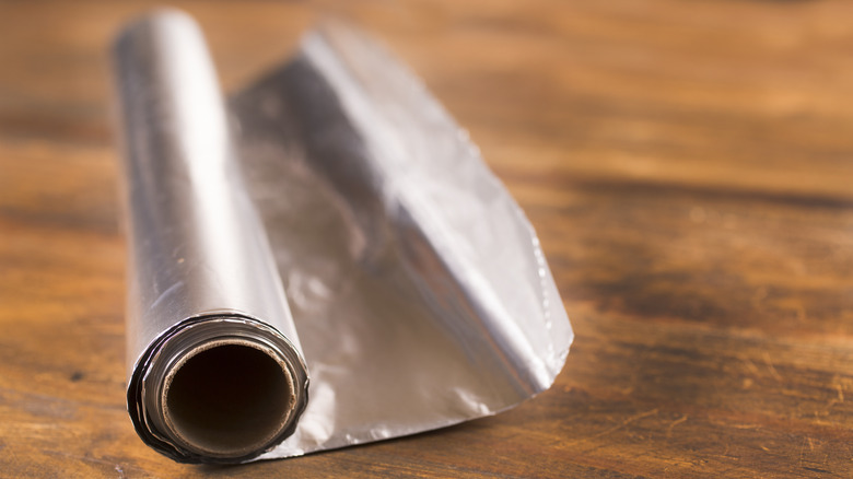 foil on wooden table