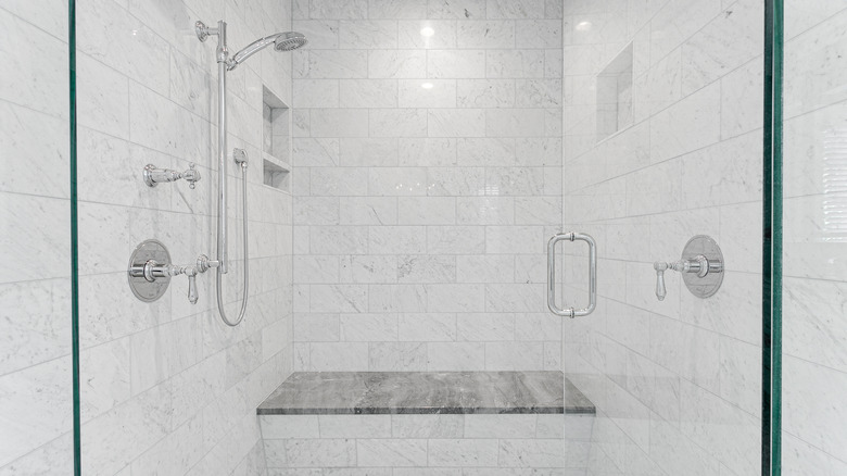 Walk-in shower with mitered tile edges