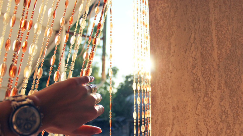 beaded curtains hanging in window