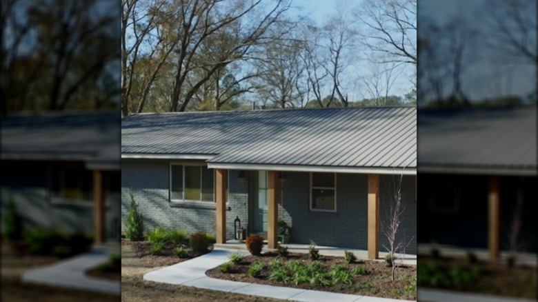 dark exterior with wooden columns