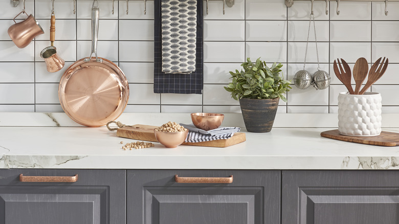 kitchen counter with copper items