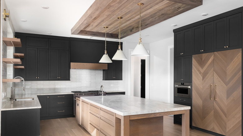 Modern rustic kitchen with wood paneling detail on the ceiling