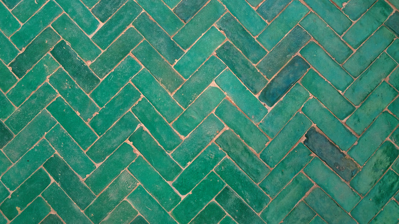 green herringbone ceramic tile