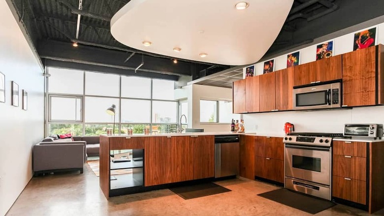 modern kitchen with brown cabinets 