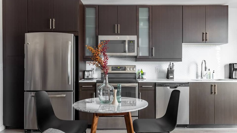 modern kitchen with brown cabinets 