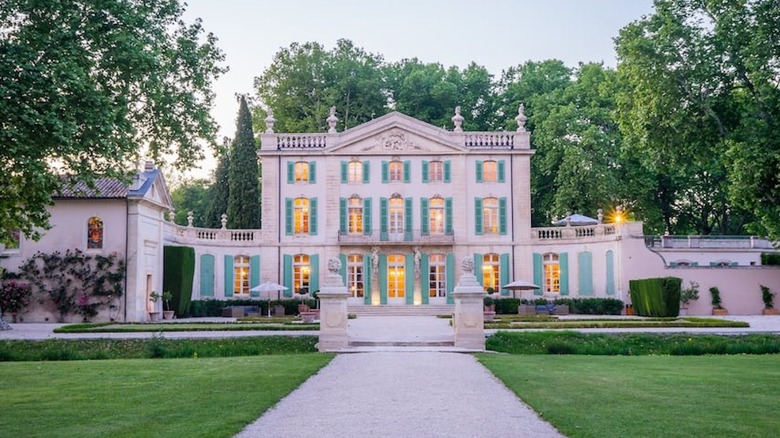 A pink and green French castle