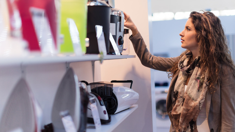 A person shopping for luxury appliances