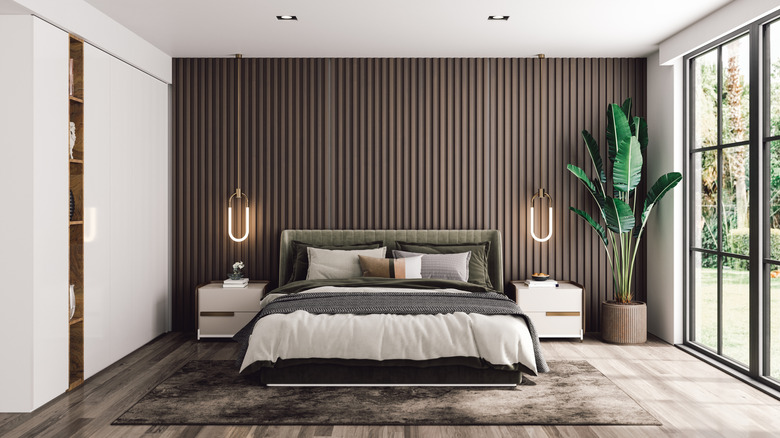 Brown-toned bedroom with an oversized window