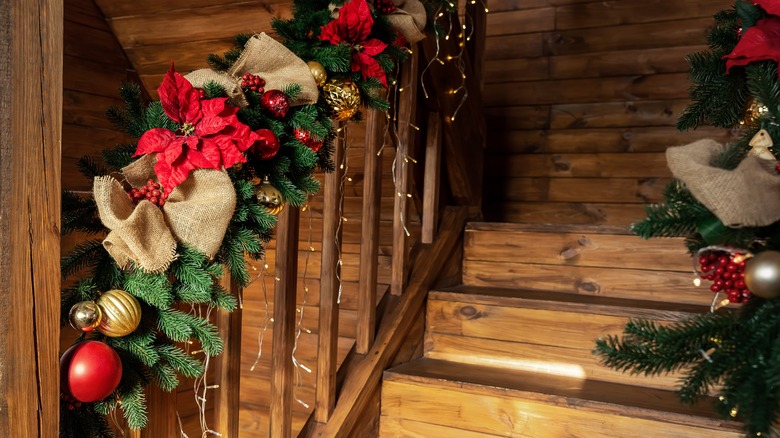 christmas garland on wood staircase