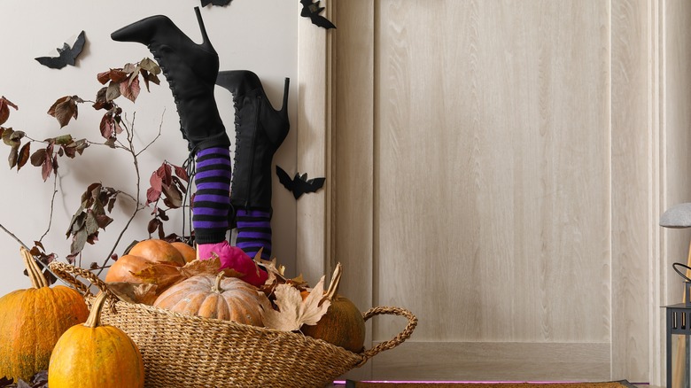 witch leg decoration in basket