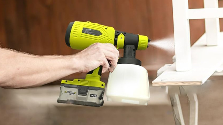 HaopkZapyr Cordless HVLP Paint Spray Gun being used on wood furniture