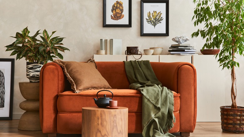 orange loveseat in living room