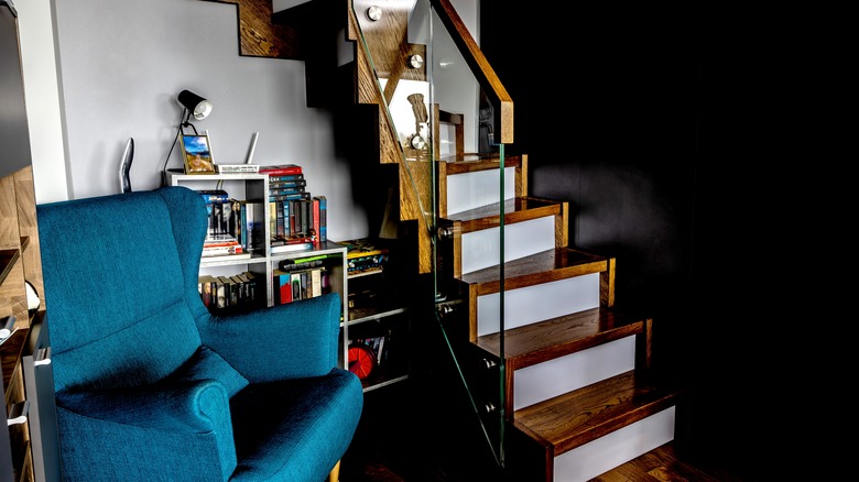 cozy reading nook under stairs