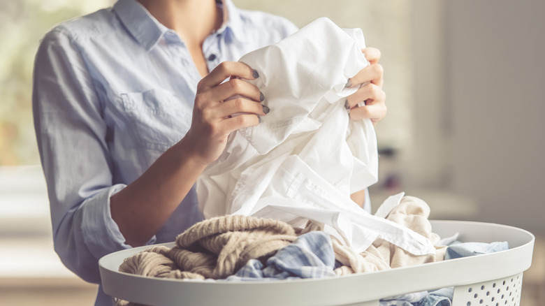 Woman holding laundry