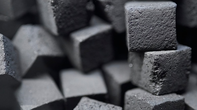 charcoal bricks stacked