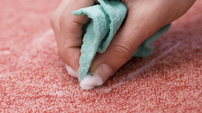 Cleaning carpet by hand