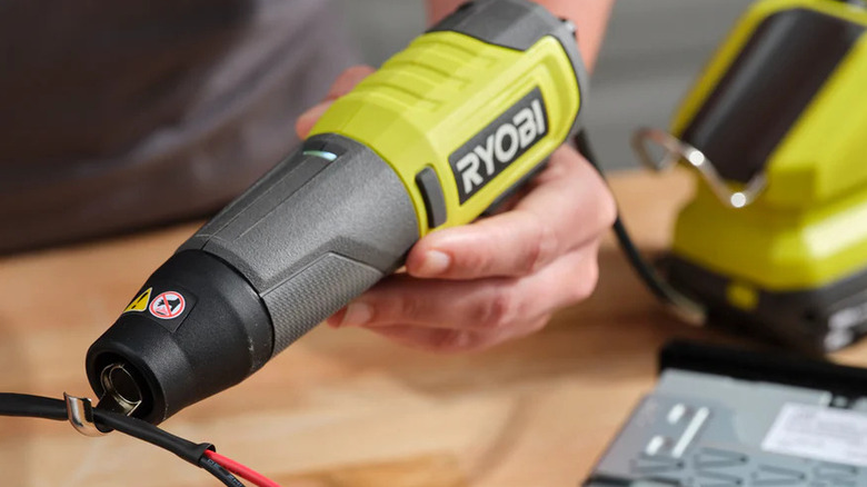 The RYOBI Heat pen being used for electrical work.