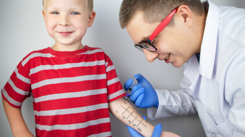 Examining a child for allergic reactions