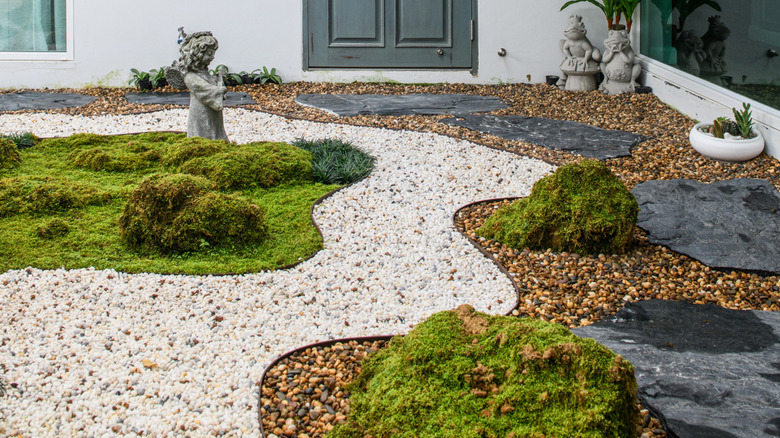 Garden path with moss-covered rocks