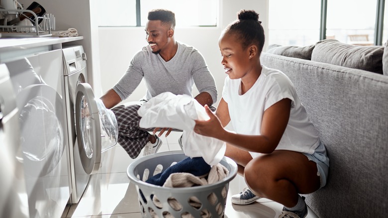 Couple doing laundry