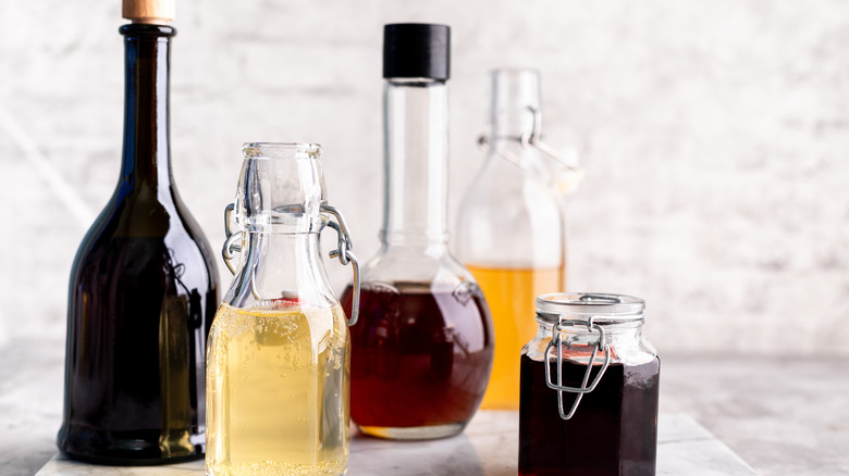 Multiple vinegar bottles