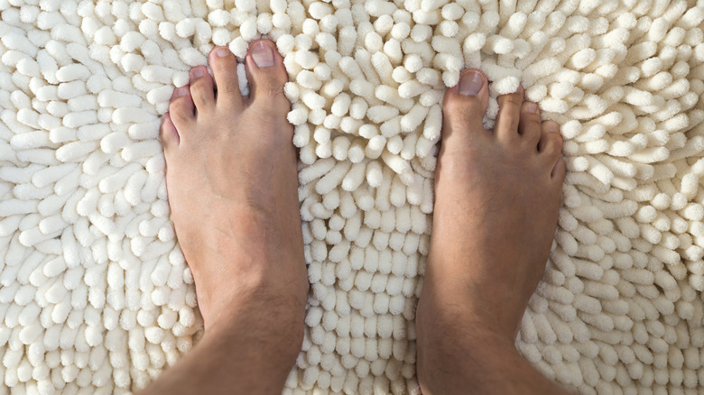 Feet on a rug