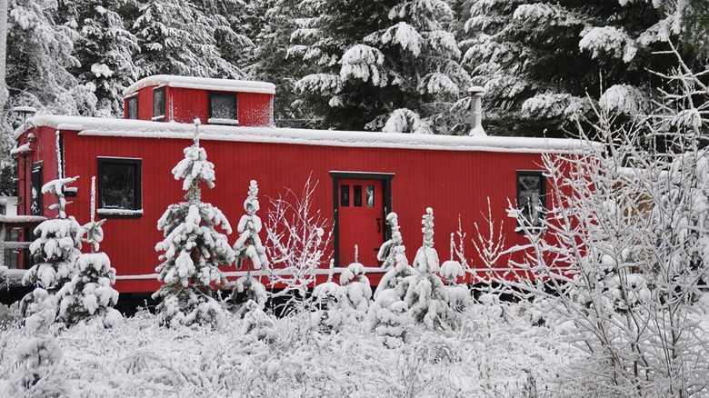 Train car house in winter