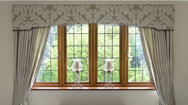 A window with a patterned valance