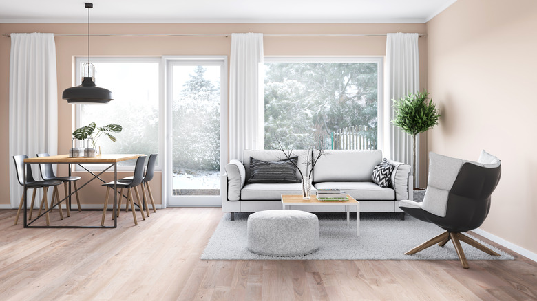 A living room is painted in light beige.