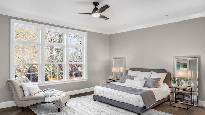 Grey bedroom with white trim