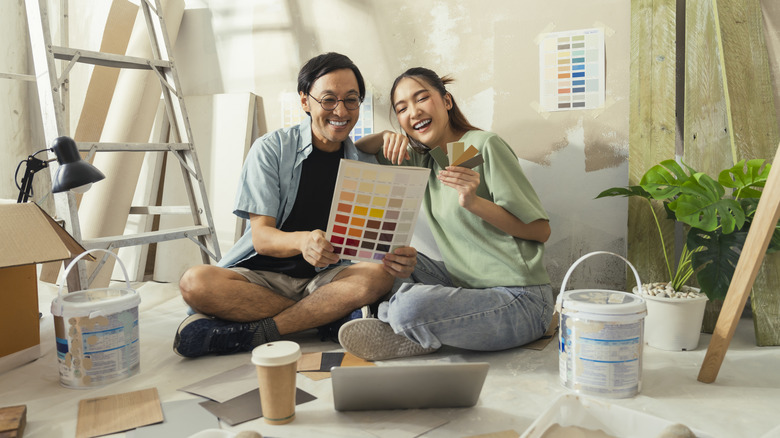 couple choosing paint color