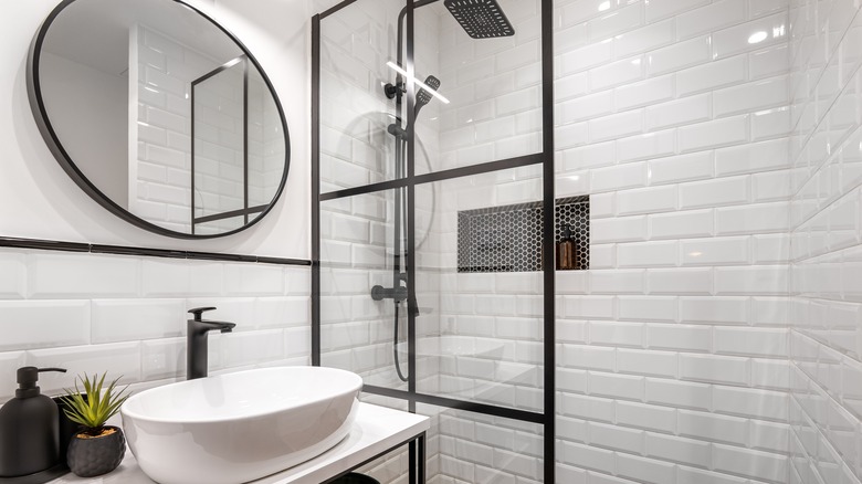 white bathroom with black hardware