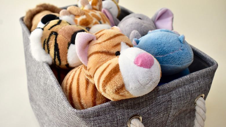 bin of stuffed animals