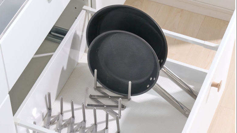 IKEA VARIERAs in a drawer being used to hold pans upright